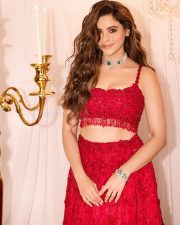Beautiful Aamna Sharif in a Red Shimmery Lehenga Photos 08