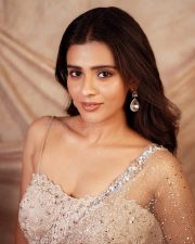 Beautiful Actress Hebah Patel in a See Through Shimmering Saree with a Sleeveless Blouse Photos 02