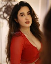 Busty Aditi Budhathoki Cleavage in a Red Mesh Long Sleeved Crop Top Pictures 01