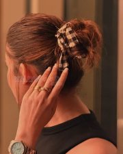 Charming Actress Nayanthara in a Black Ribbed Sleeveless Top and Checkered Skirt Photos 02