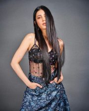 Chic Actress Shruti Haasan in a sheer black crop top and blue skirt Photos 03
