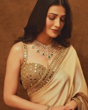 Elegant Actress Shruti Haasan in a Golden Embellished Saree Photos 01