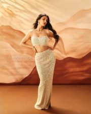 Elegant Actress Shruti Haasan in a Ivory Pearl Embroidered Lehenga Photos 03