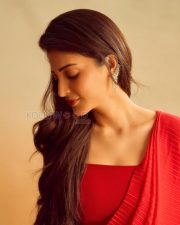 Elegant Actress Shruti Haasan in a Red Pleated Saree Photos 04