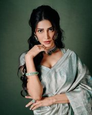 Enchanting Actress Shruti Hassan in a Silver Grey Embroidered Saree Photos 03