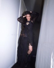 Fashionista Shruti Haasan in a Black Ruffle Maxi Dress with Thigh High Boots Photos 07