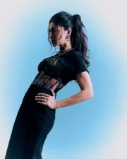 Fierce Actress Shruti Haasan in a Black gothic band graphic tee with sheer mesh corset panel midi skirt and silver spike chokers Photos 01