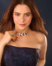 Glamorous Actress Aamna Sharif in a Navy Blue Sequined Strapless Gown Photos 01