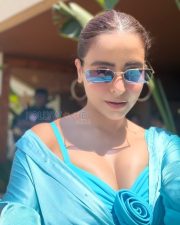 Glamorous Actress Aamna Sharif in a Turquoise Satin Rose Dress Photos 02