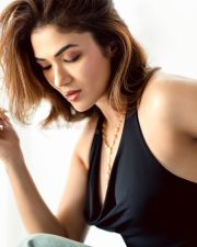 Glamorous Actress Ridhima Pandit in a Black Halter Top Studio Photos 01