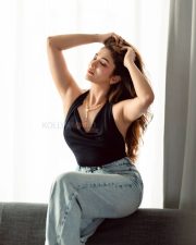 Glamorous Actress Ridhima Pandit in a Black Halter Top Studio Photos 02