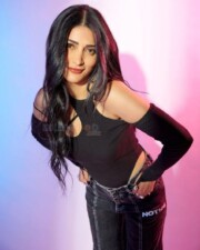 Glamorous Shruti Haasan in a High Neck Glove Bodysuit Pictures 02