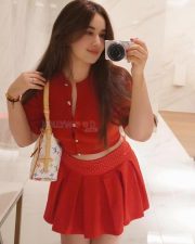 Gorgeous Nepali Actress Aditi Budhathoki in a Red Button Up Crop Top with a Pleated Red Mini Skirt Pictures 01