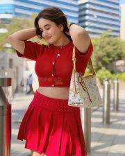 Gorgeous Nepali Actress Aditi Budhathoki in a Red Button Up Crop Top with a Pleated Red Mini Skirt Pictures 03