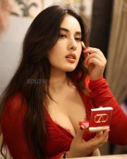 Hot Nepali Model Aditi Budhathoki in a Red Mesh Long Sleeved Crop Top with a White High Waisted Jeans Photos 03