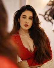 Hot Nepali Model Aditi Budhathoki in a Red Mesh Long Sleeved Crop Top with a White High Waisted Jeans Photos 04