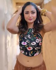 Kis Kisko Pyaar Karoon 2 Actress Tridha Choudhury in a Black Floral Halter Neck Crop Top with a Brown Trousers Photos 03