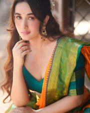 Nepali Actress Aditi Budhathoki n a Green and Orange Silk Saree Photos 03
