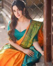 Nepali Actress Aditi Budhathoki n a Green and Orange Silk Saree Photos 04