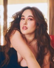 Nepali Cinema Actress Aditi Budhathoki Cleavage in a Black Sleeveless Camisole Top with Spaghetti Straps Pictures 02