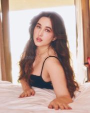 Nepali Cinema Actress Aditi Budhathoki Cleavage in a Black Sleeveless Camisole Top with Spaghetti Straps Pictures 03