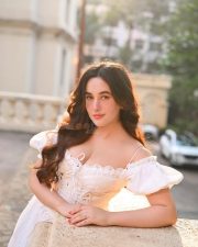 Nepali Natural Beauty Aditi Budhathoki in a White off Shoulder Lace Corset Dress Pictures 06