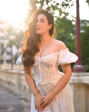 Nepali Natural Beauty Aditi Budhathoki in a White off Shoulder Lace Corset Dress Pictures 09