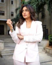 Om Shanti Shanti Shantihi Actress Eesha Rebba in a White Single Breasted Blazer with a White Top and Matching Trousers Photos 03