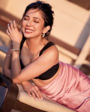 Please Find Attached Actress Barkha Singh Cleavage in a Black Balconette Style Bikini Top and Pink Satin Skirt Photos 03