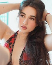 Provocative Aditi Budhathoki Cleavage in a Red Leopard Print Halter Dress Photos 03