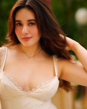 Seductive Aditi Budhathoki Cleavage in a White Lace Camisole Photos 01
