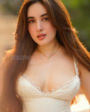 Seductive Aditi Budhathoki Cleavage in a White Lace Camisole Photos 02