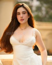 Seductive Aditi Budhathoki Cleavage in a White Lace Camisole Photos 03