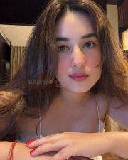 Sensual Aditi Budhathoki Cleavage in a White Spaghetti Strap Top Photos 01