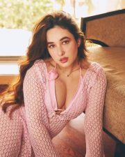 Sensual Aditi Budhathoki Cleavage in a pink knit cardigan Photos 01