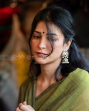 Serene Actress Shruti Haasan in an Olive Green Linen Saree Photos 02
