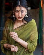 Serene Actress Shruti Haasan in an Olive Green Linen Saree Photos 04