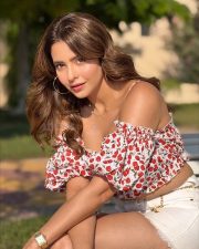 Sexy Aamna Sharif in an Off Shoulder Red Cherry Printed Crop Top with a White Denim Shorts Pictures 02