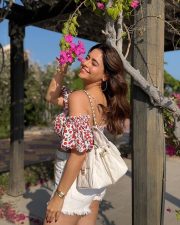 Sexy Aamna Sharif in an Off Shoulder Red Cherry Printed Crop Top with a White Denim Shorts Pictures 03