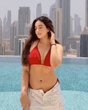 Sexy Nepali Actress Aditi Budhathoki in a Red Bikini and White Mini Skirt Photos 01