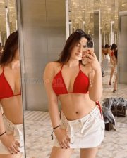 Sexy Nepali Actress Aditi Budhathoki in a Red Bikini and White Mini Skirt Photos 02