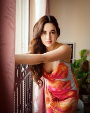 Sexy Nepali Model Aditi Budhathoki in an Orange and Blue Sleeveless Midi Dress Photos 01