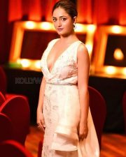 Sin Whispers of Guilt Actress Tridha Choudhury in an Off White Embroidered Deep Cleavage Sleeveless Dress Pictures 03