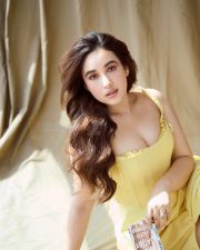 Sizzling Aditi Budhathoki in a Yellow Corset Midi Dress Photos 02