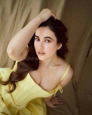 Sizzling Aditi Budhathoki in a Yellow Corset Midi Dress Photos 03