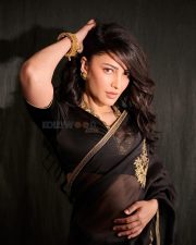 Sizzling Beauty Shruti Haasan in a Black Saree Photos 03