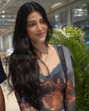 Sizzling Shruti Haasan Cleavage in a Sheer Printed Mesh Top With Blue Lace Camisole And Blue Jeans Photos 08