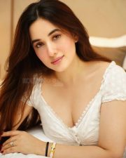 Stunning Aditi Budhathoki Cleavage in a Lace White Dress Photos 01