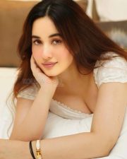 Stunning Aditi Budhathoki Cleavage in a Lace White Dress Photos 03