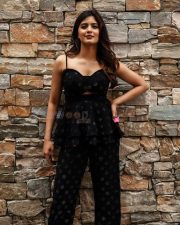 Stylish Amritha Aiyer in a Black Printed Dress Photos 01
